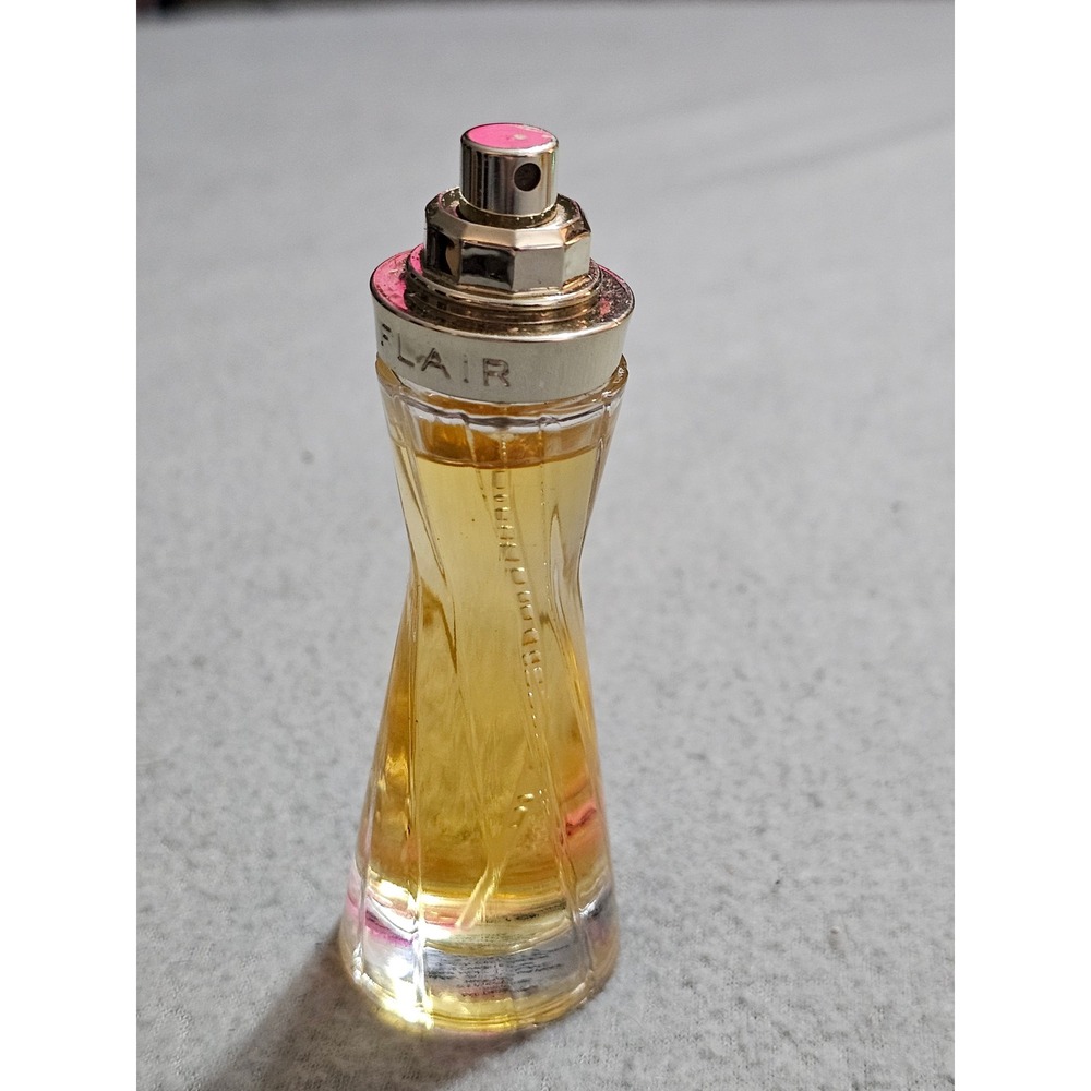 Flair eau de parfum spray by Revlon.  No cap.  excellent classic scent  vintage